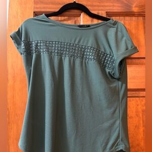 Teal Mine short sleeve blouse, size small. Cutouts across chest.